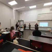 Participants listening to a lecture.