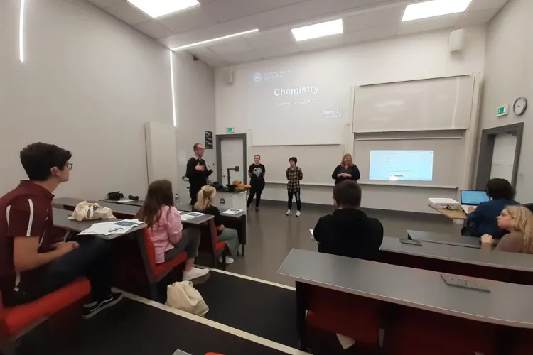 Participants listening to a lecture.